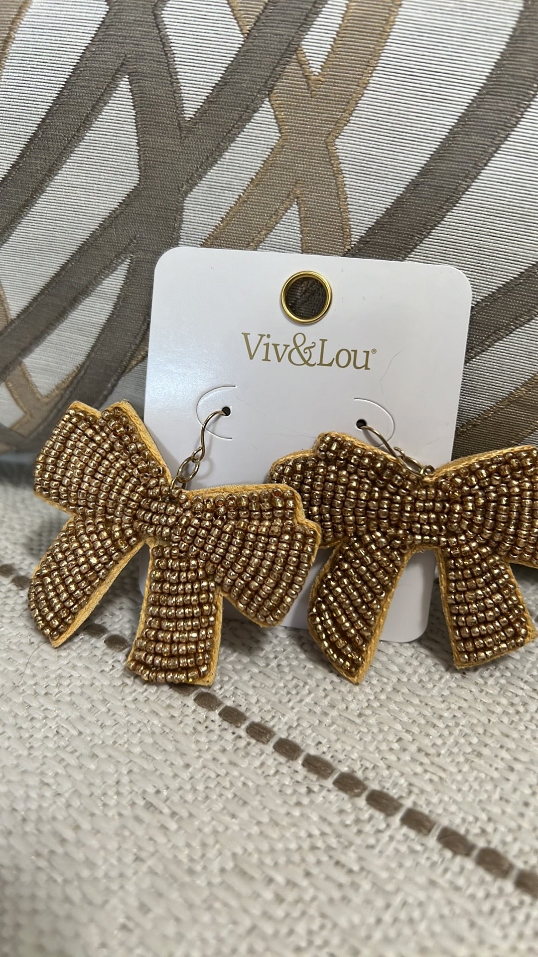 Gold bead bow earrings